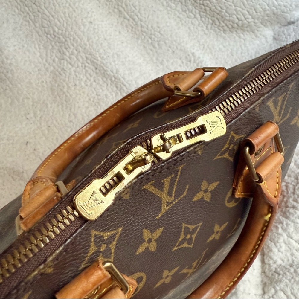Louis Vuitton Alma PM Handbag - Picture 7 of 14